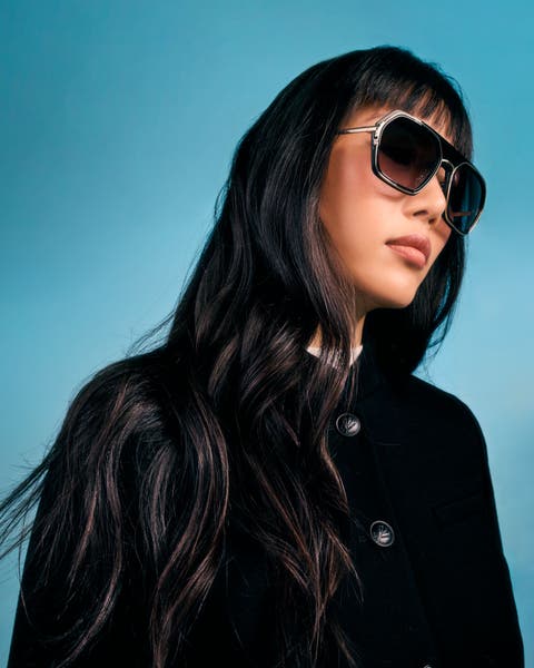 Women in large sunglasses.