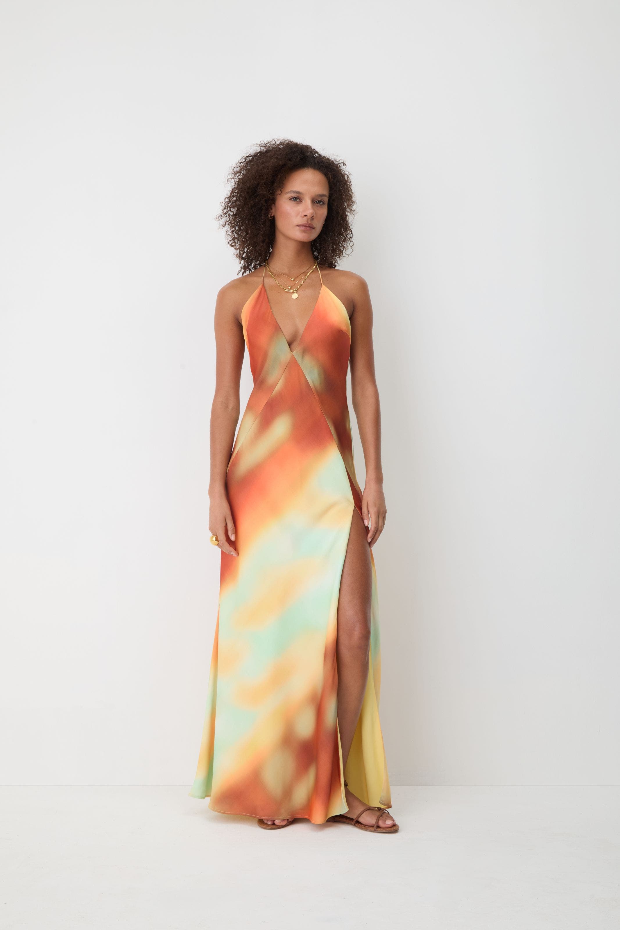 Woman in orange dress.