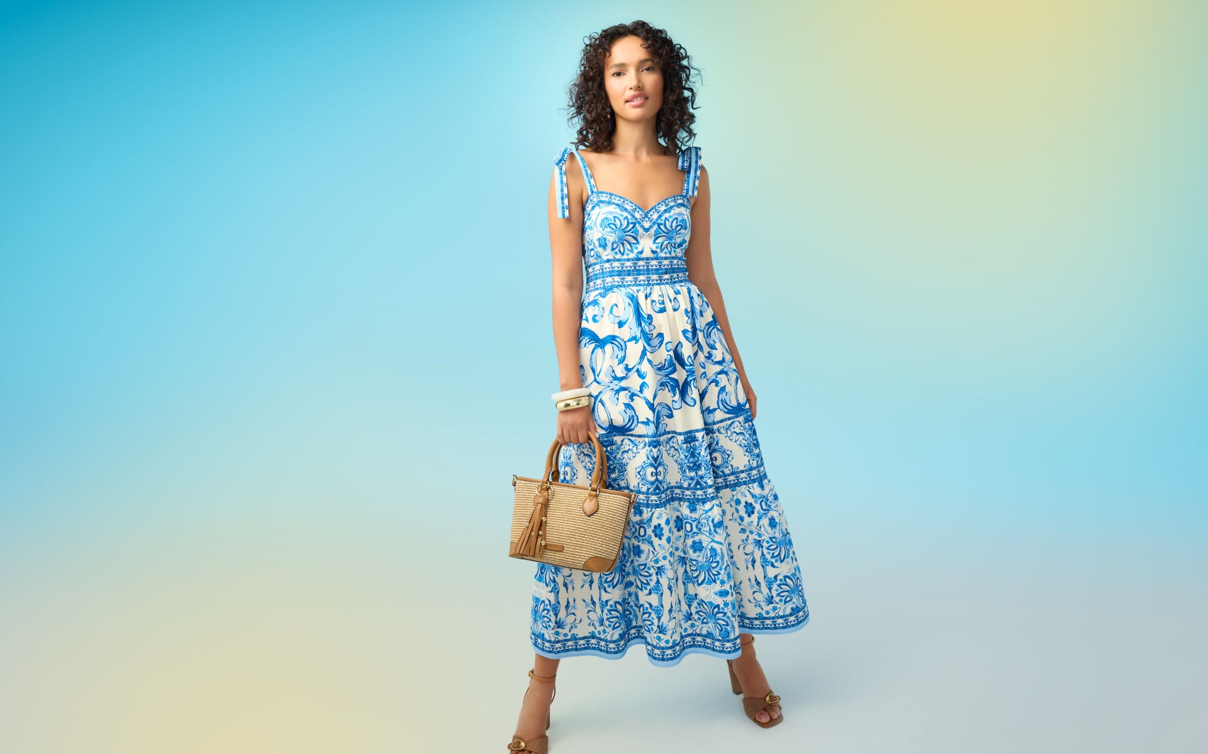 A woman in a blue and white dress.
