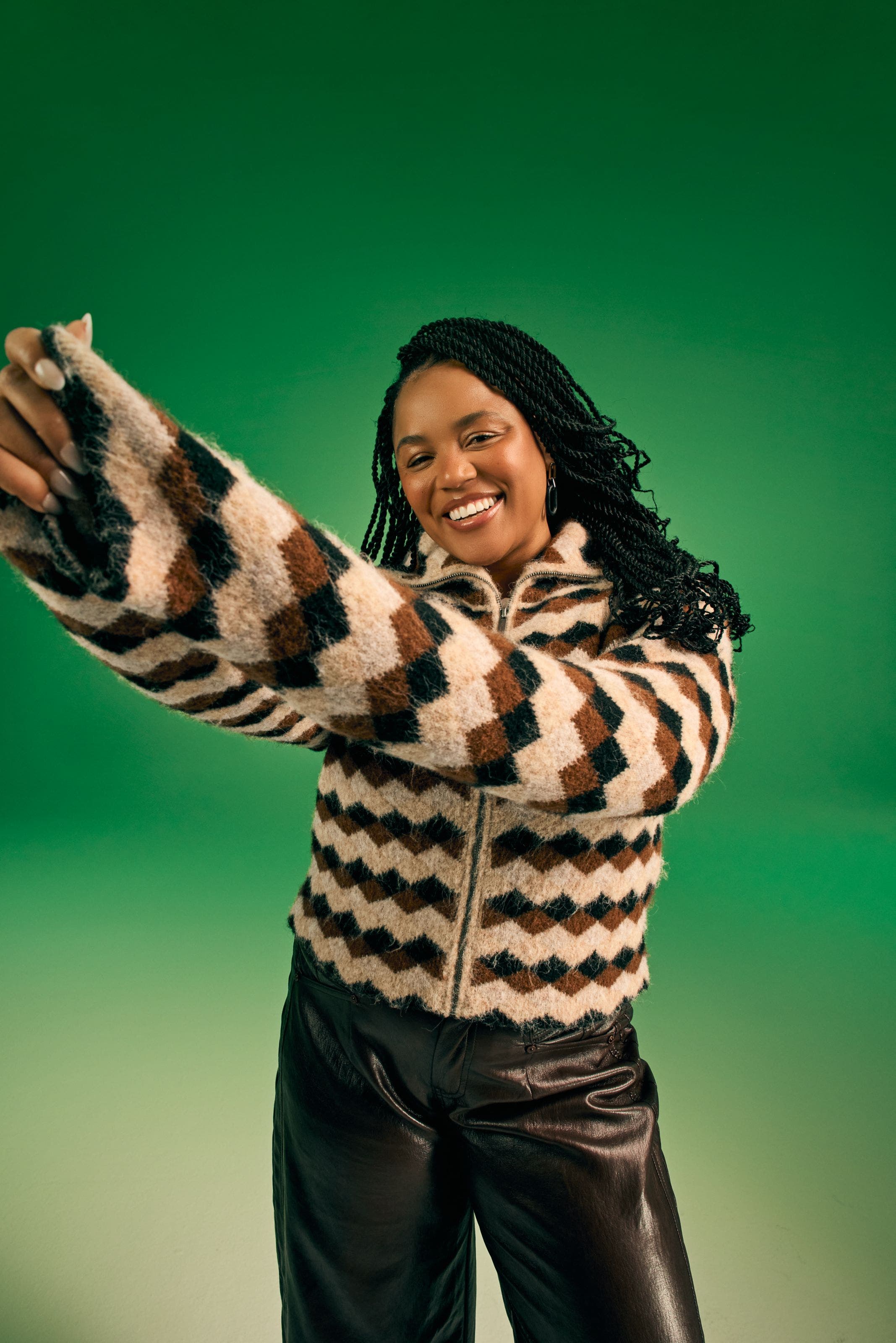 A woman in a striped sweater.