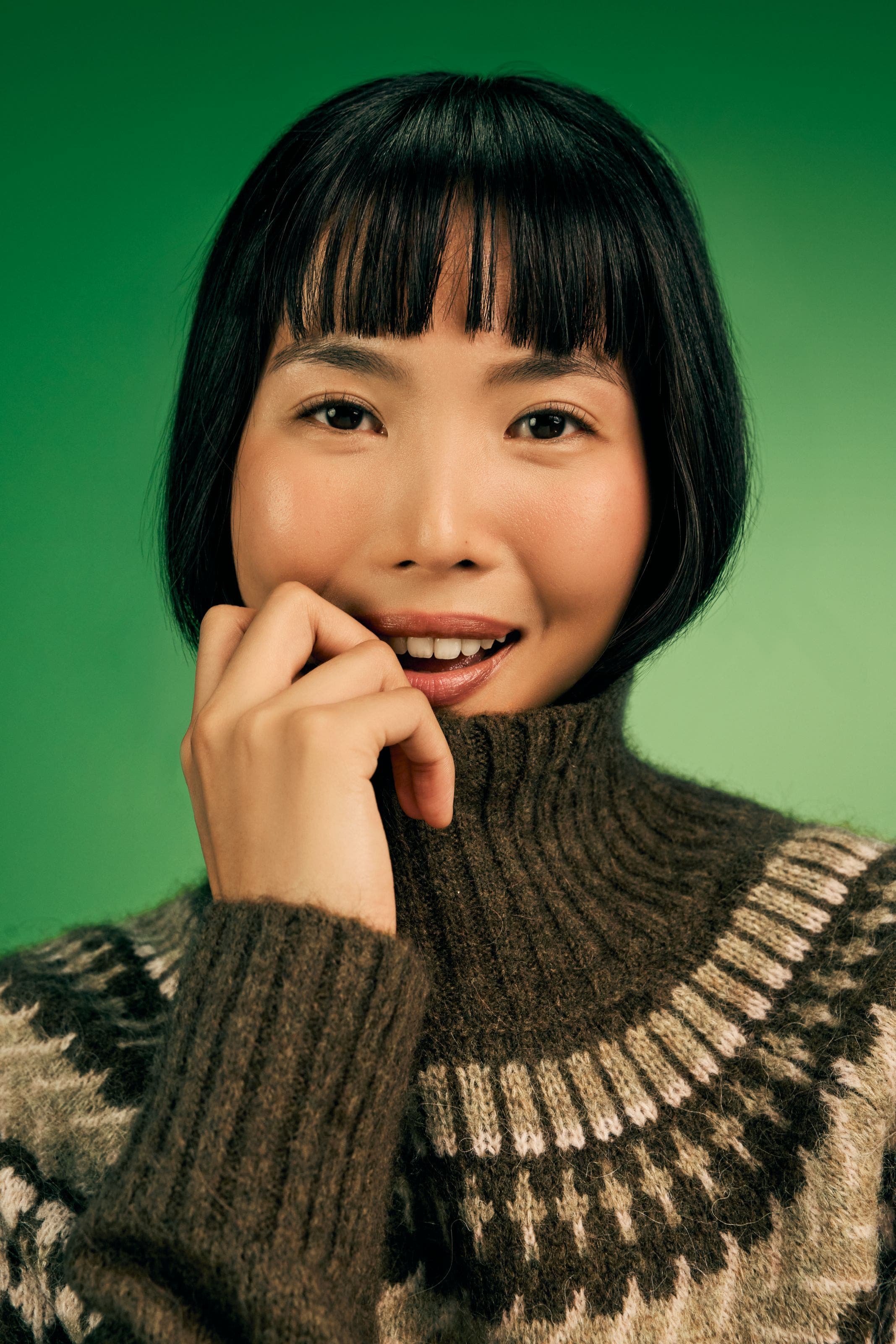 Woman wearing sweater.