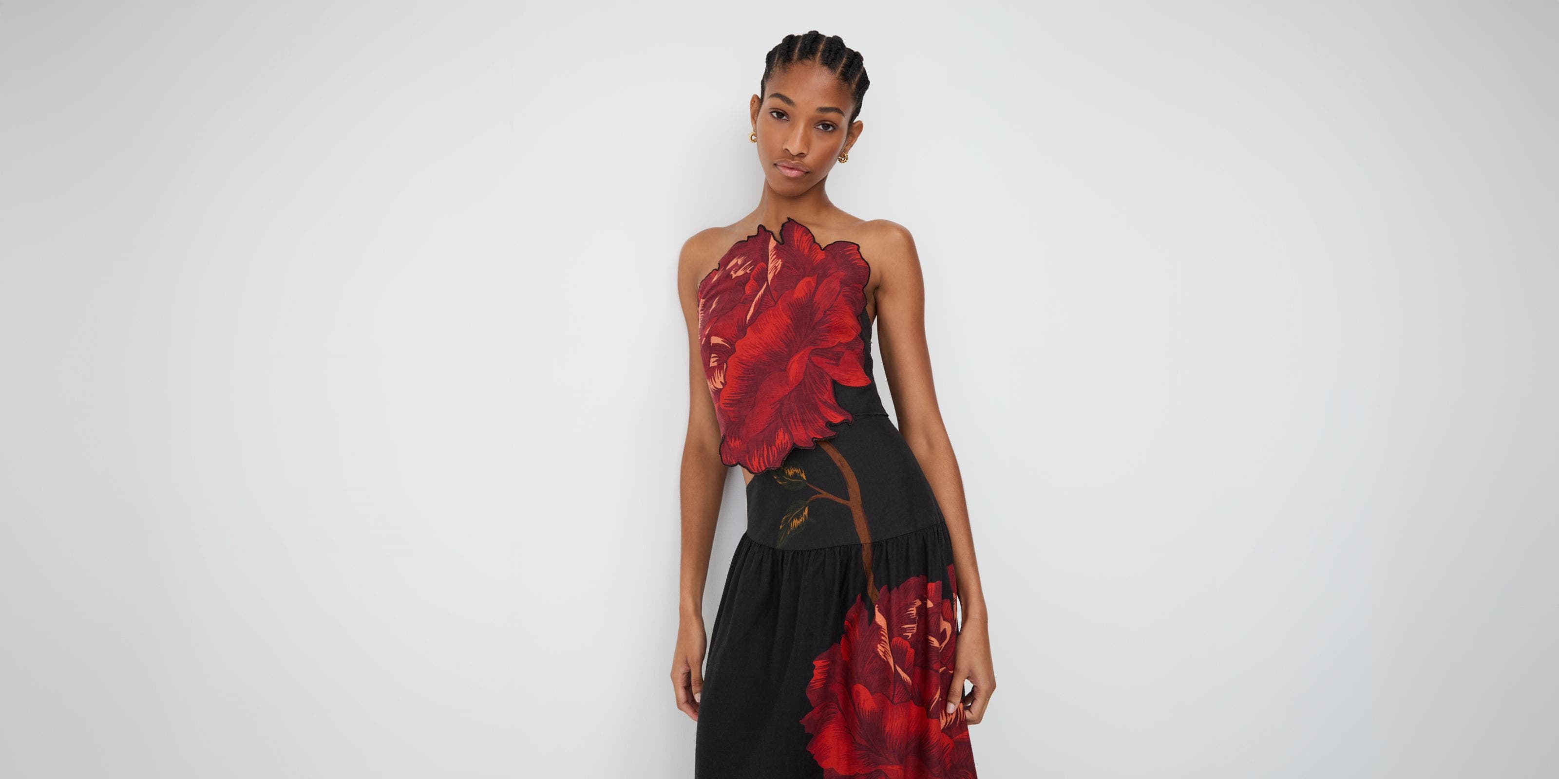 Woman wearing a floral gown.