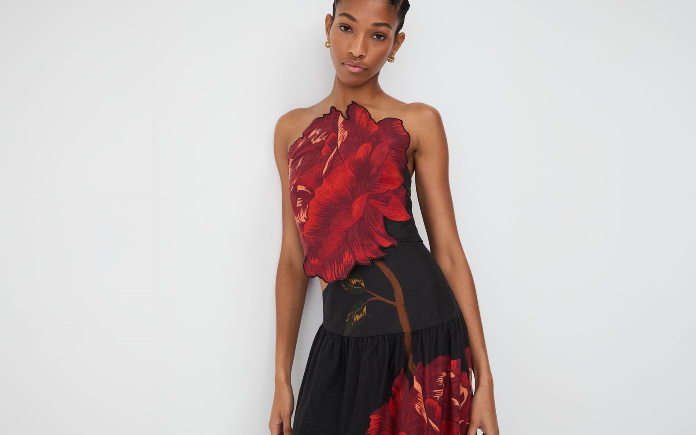 Woman wearing a floral gown.