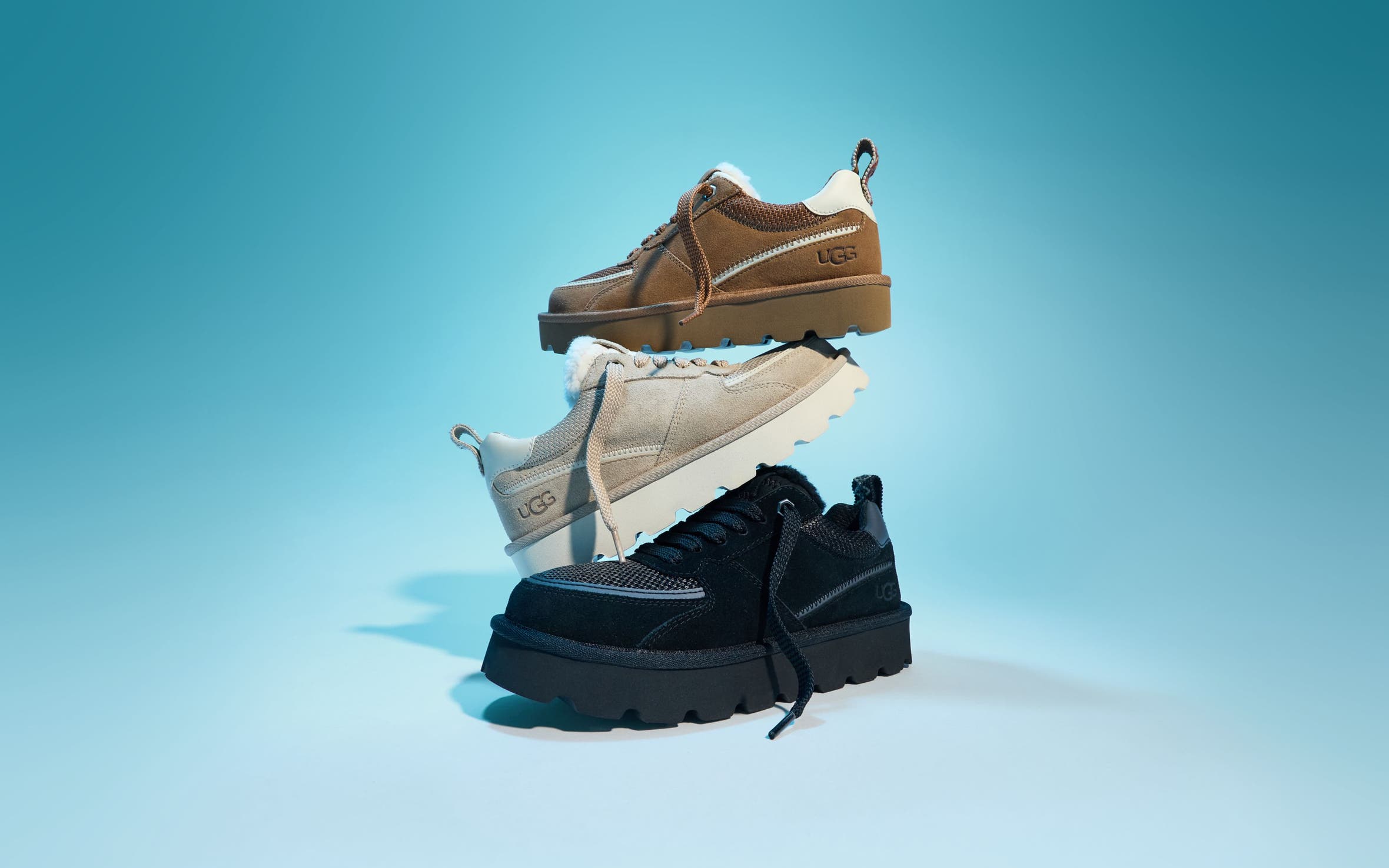 An UGG® sneaker in three different colors.  