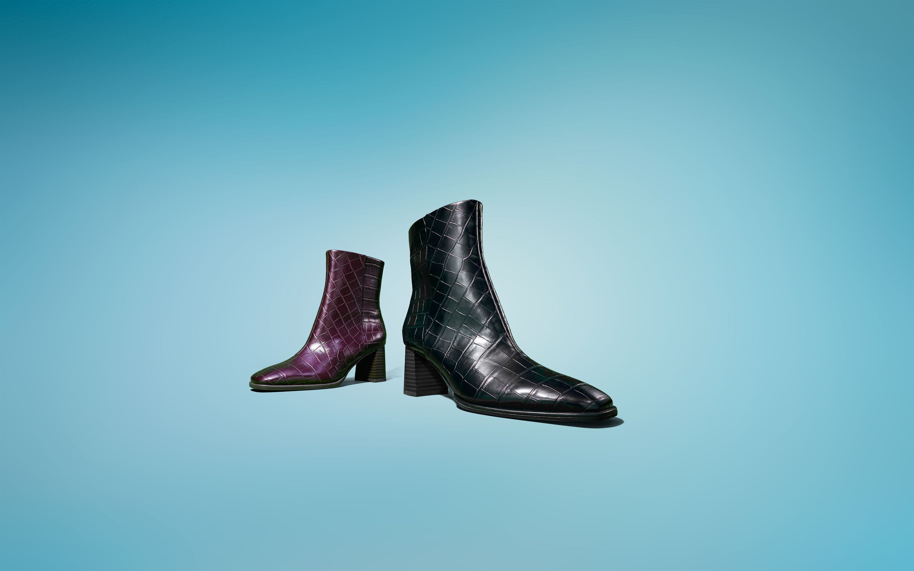 Heeled ankle boots in black and dark purple.  