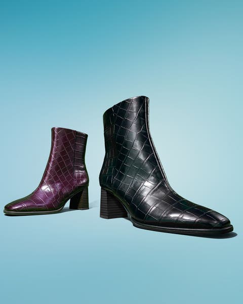 One purple boot and one black boot.