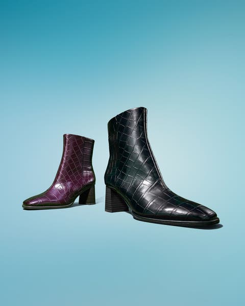 Heeled ankle boots in black and dark purple.
