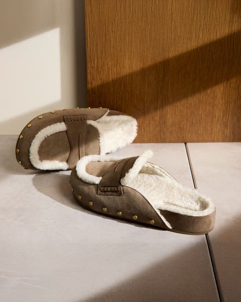 A pair of shearling-lined shoes.