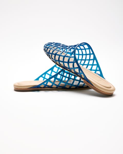 Blue jelly sandals.