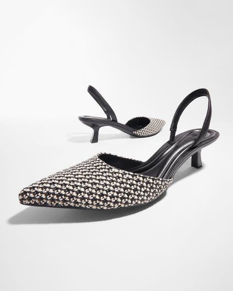A pair of woven slingback sandals.