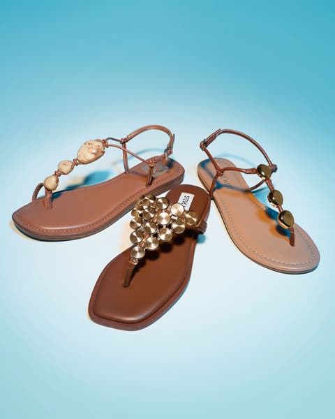 Three strappy flat sandals.