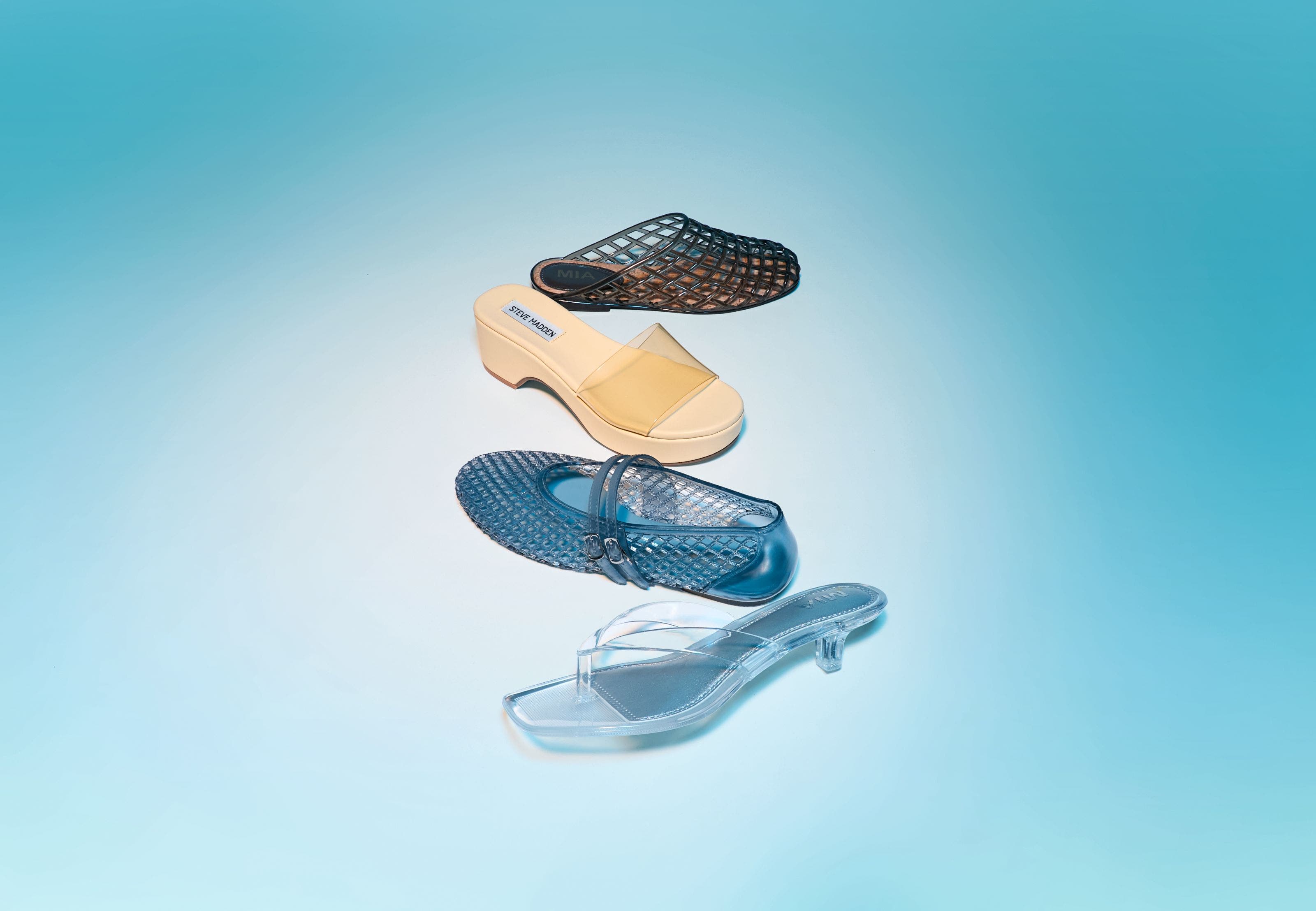 Image of four different jelly sandals. 