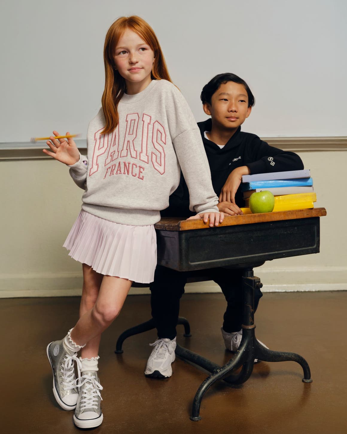 Two kids wearing Abercrombie Kids clothing.