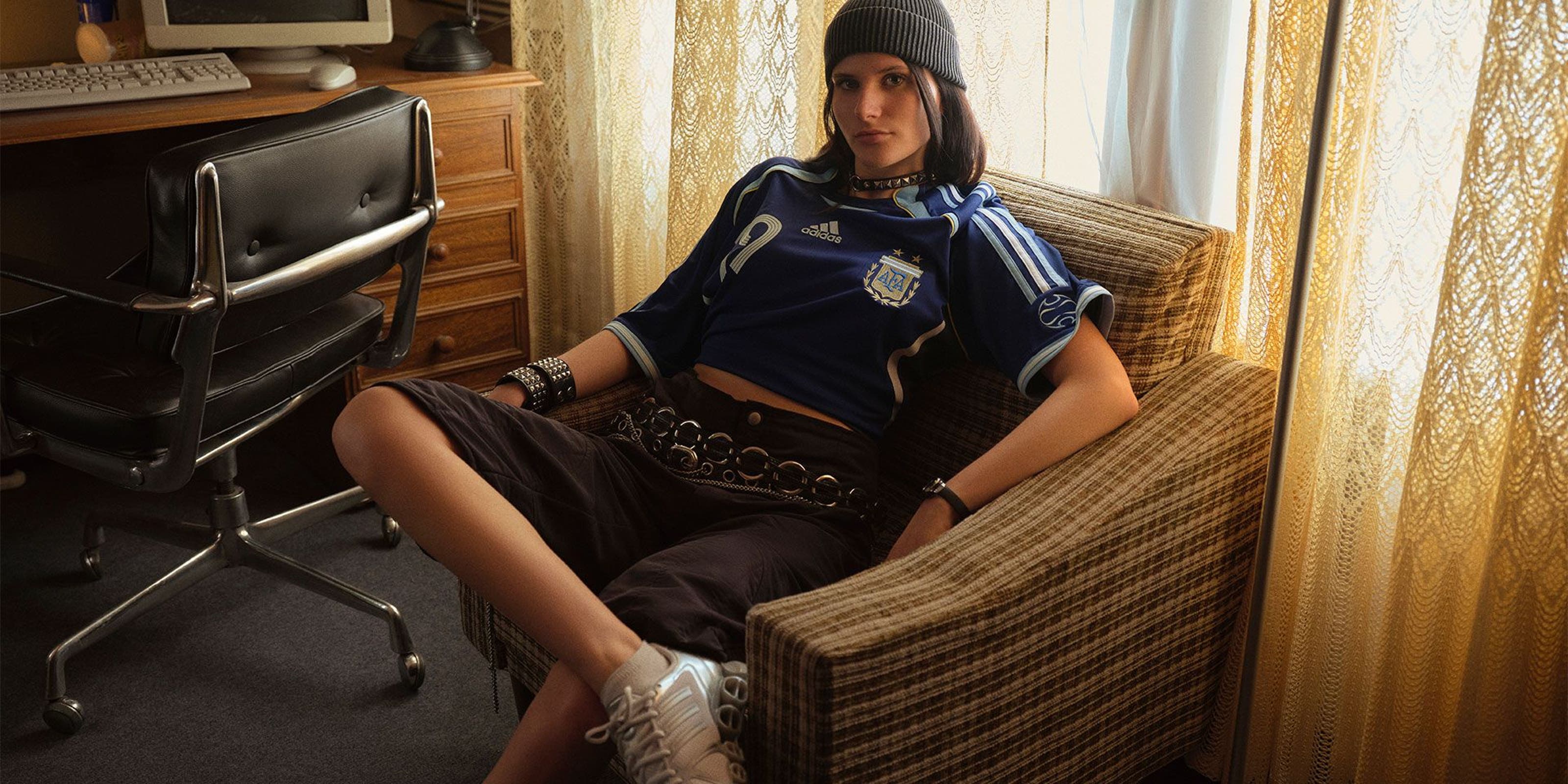 Woman sitting in chair.