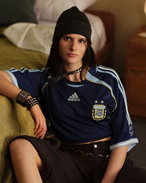 A woman wearing soccer gear.