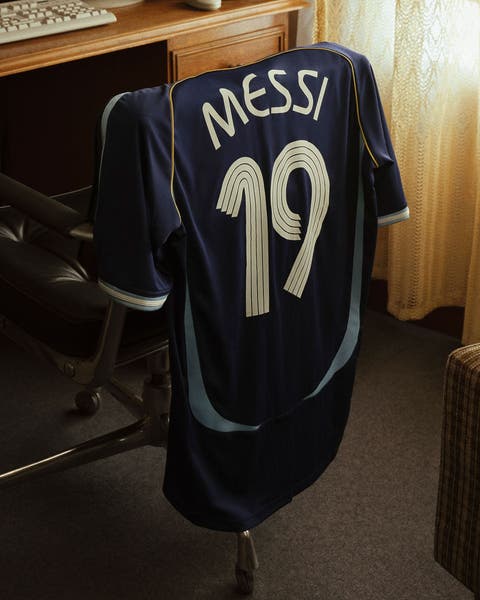 Messi soccer jersey on a chair.