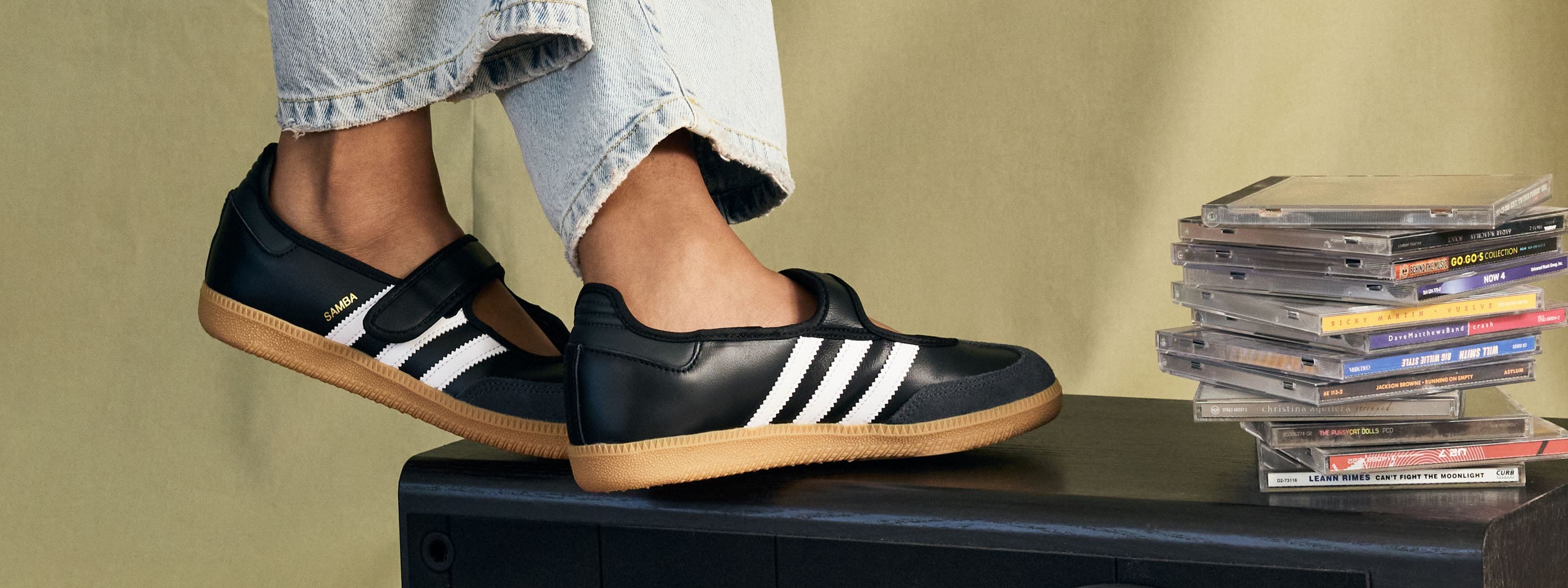 A Pair of Black Adidas