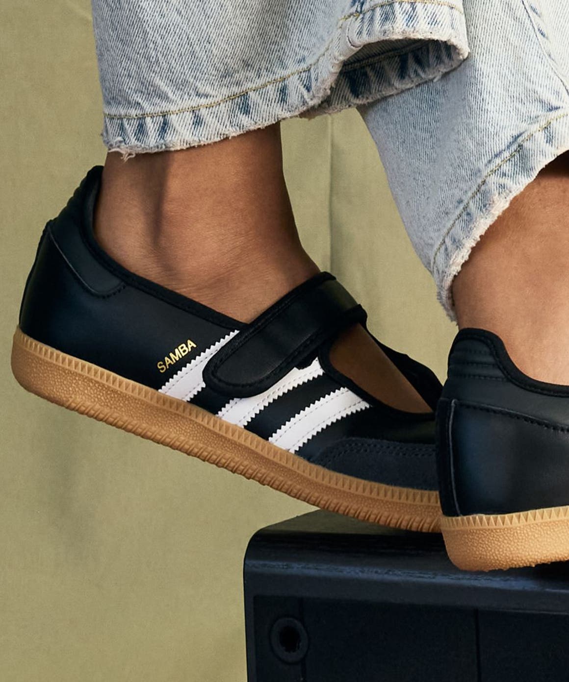 A Pair of Black Adidas