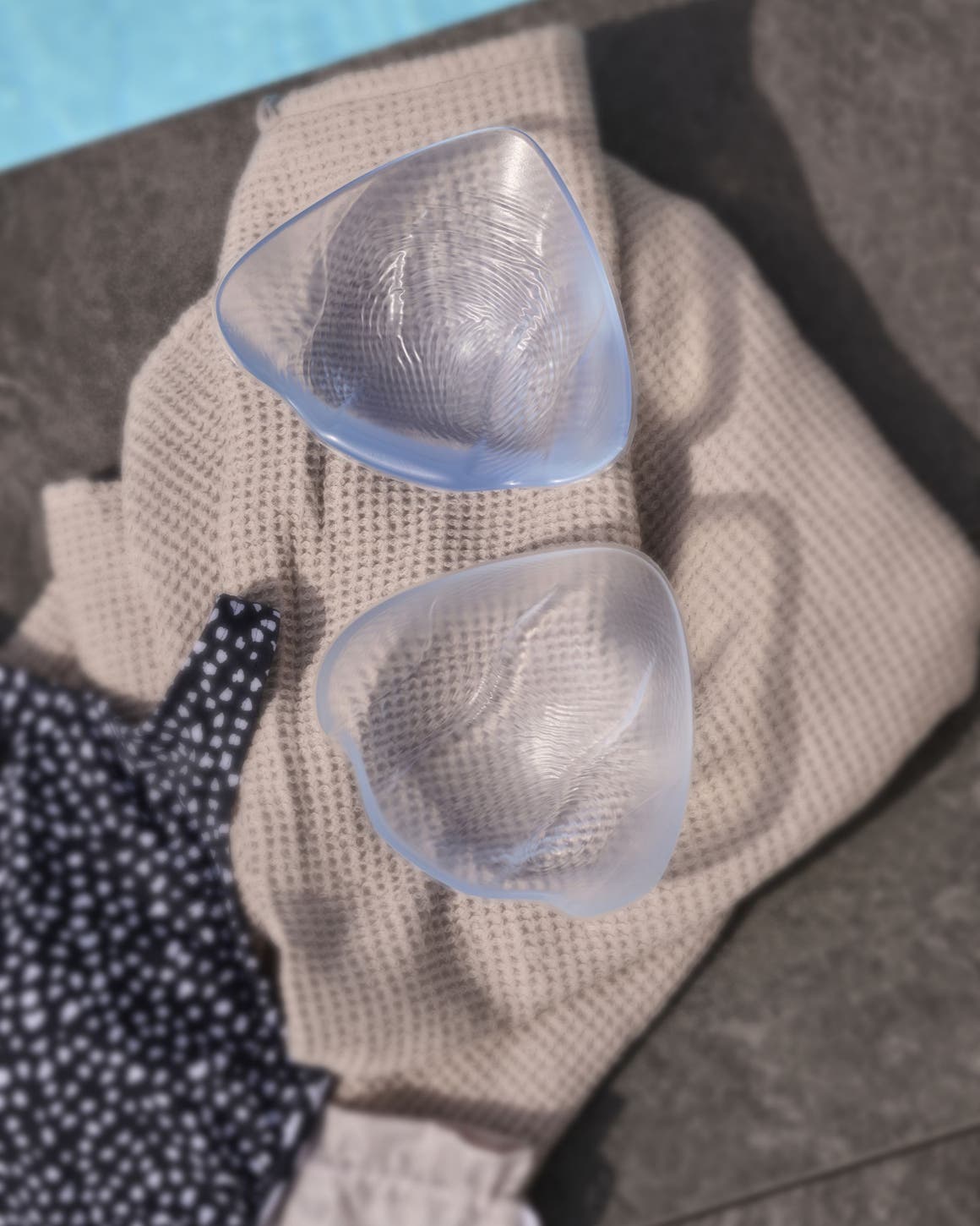 Pair of clear breast forms.