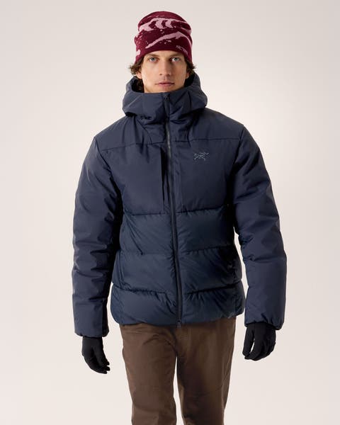 A man wearing a puffer jacket.