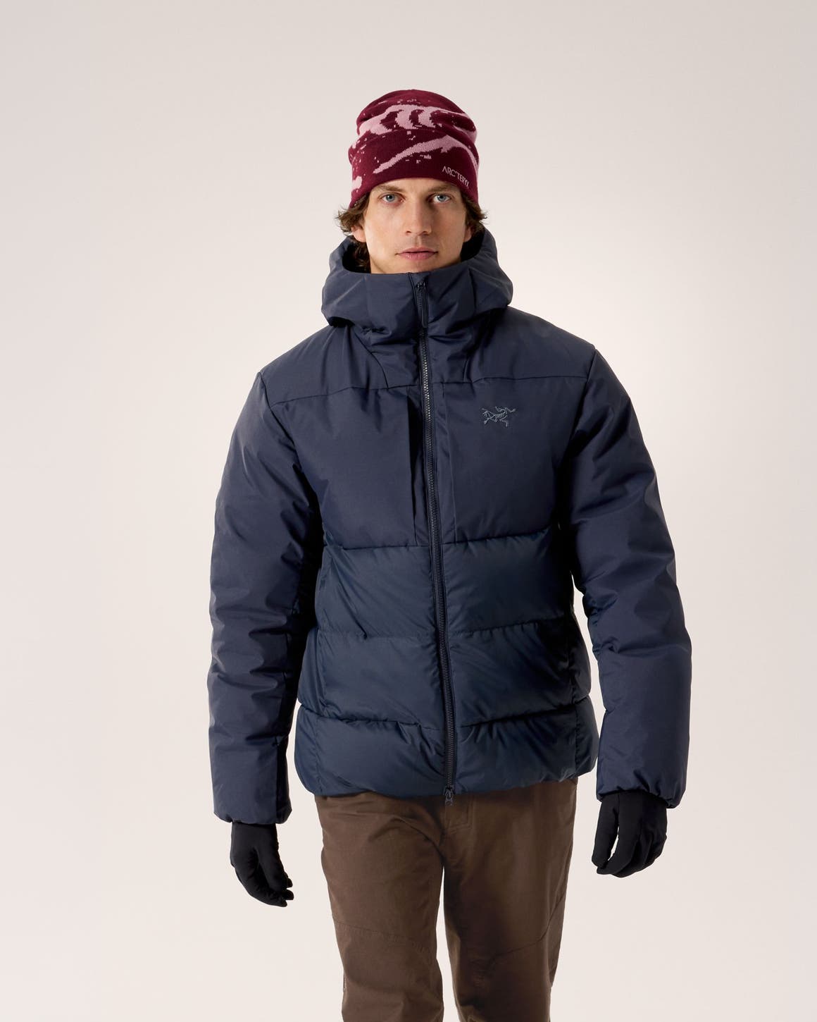 Two men wearing outerwear from Arc'teryx and Veilance.