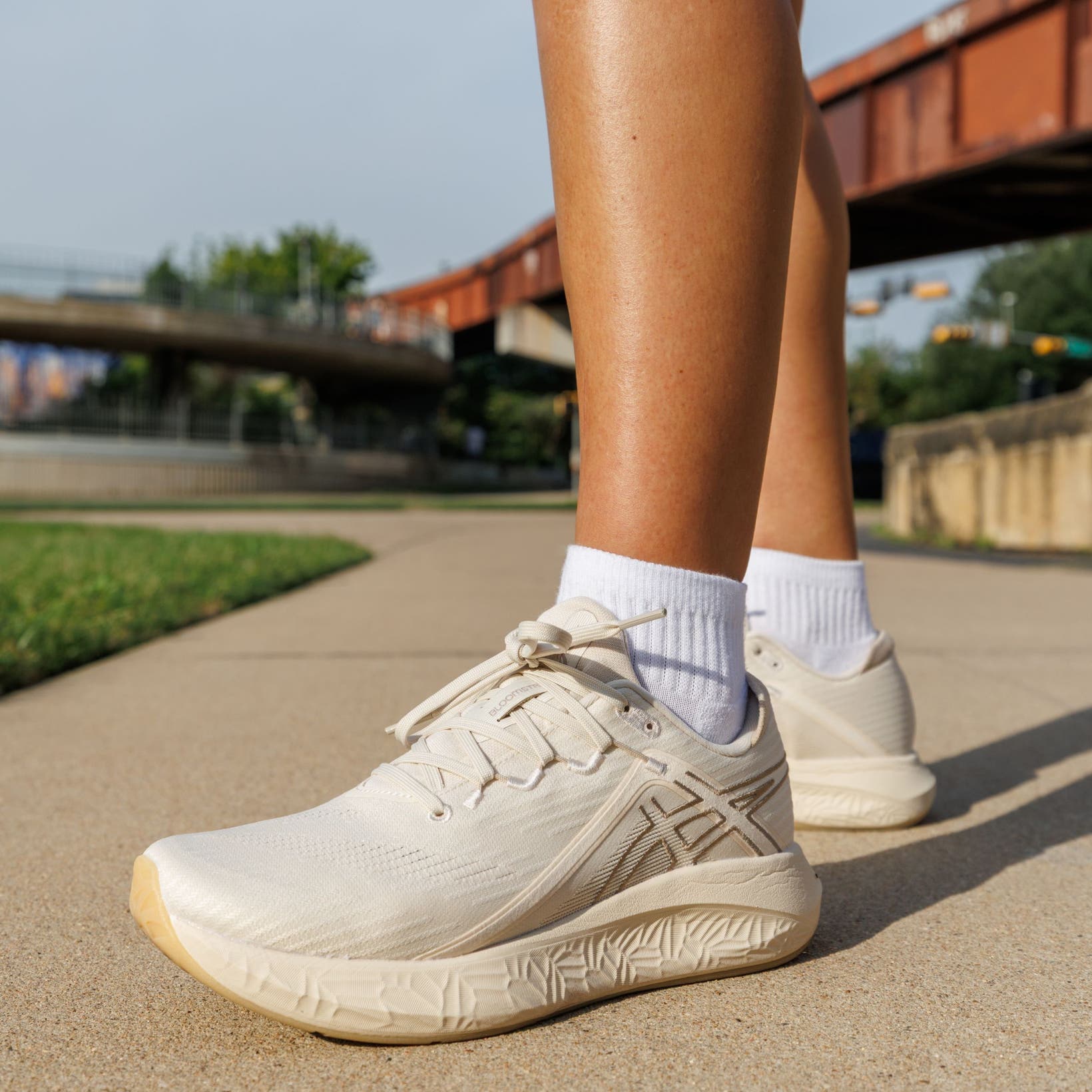 ASICS® sneakers.