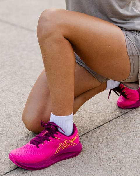 ASICS® sneakers.