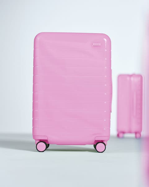 Pink suitcase.