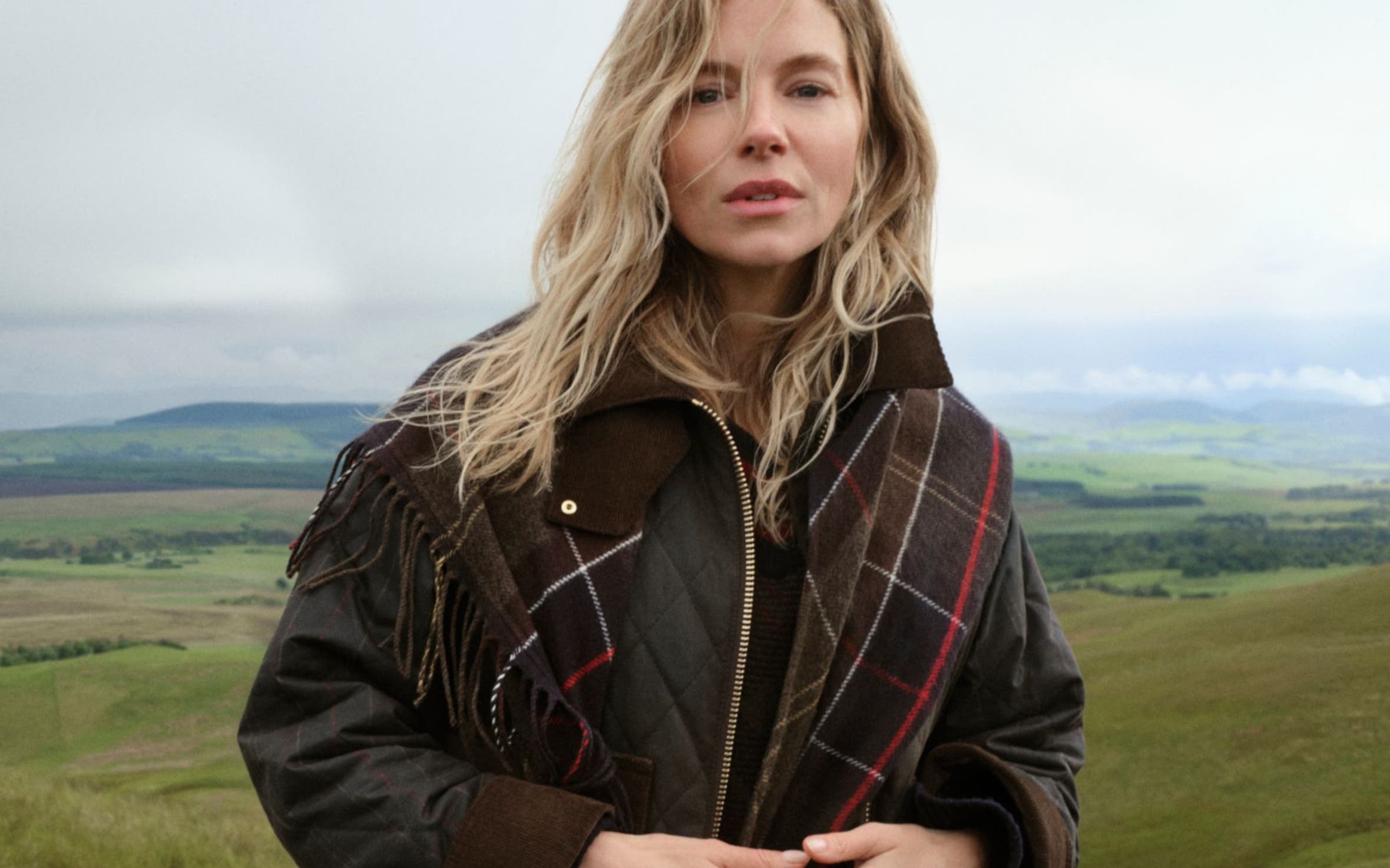 Sienna Miller in a plaid Barbour Jacket.