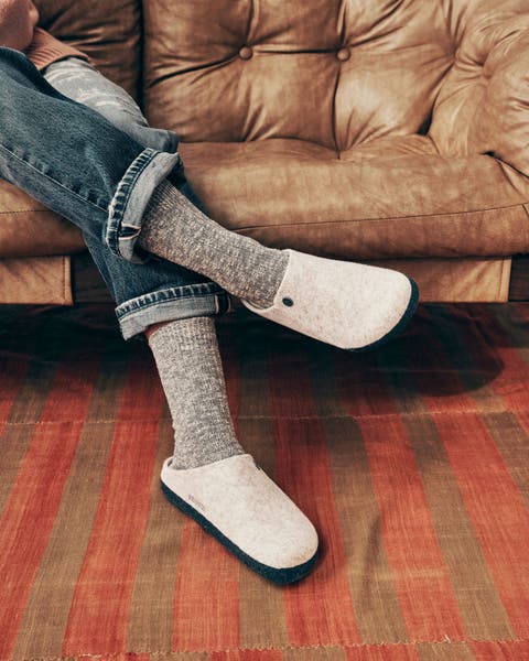 Girl wearing Birkenstock slippers