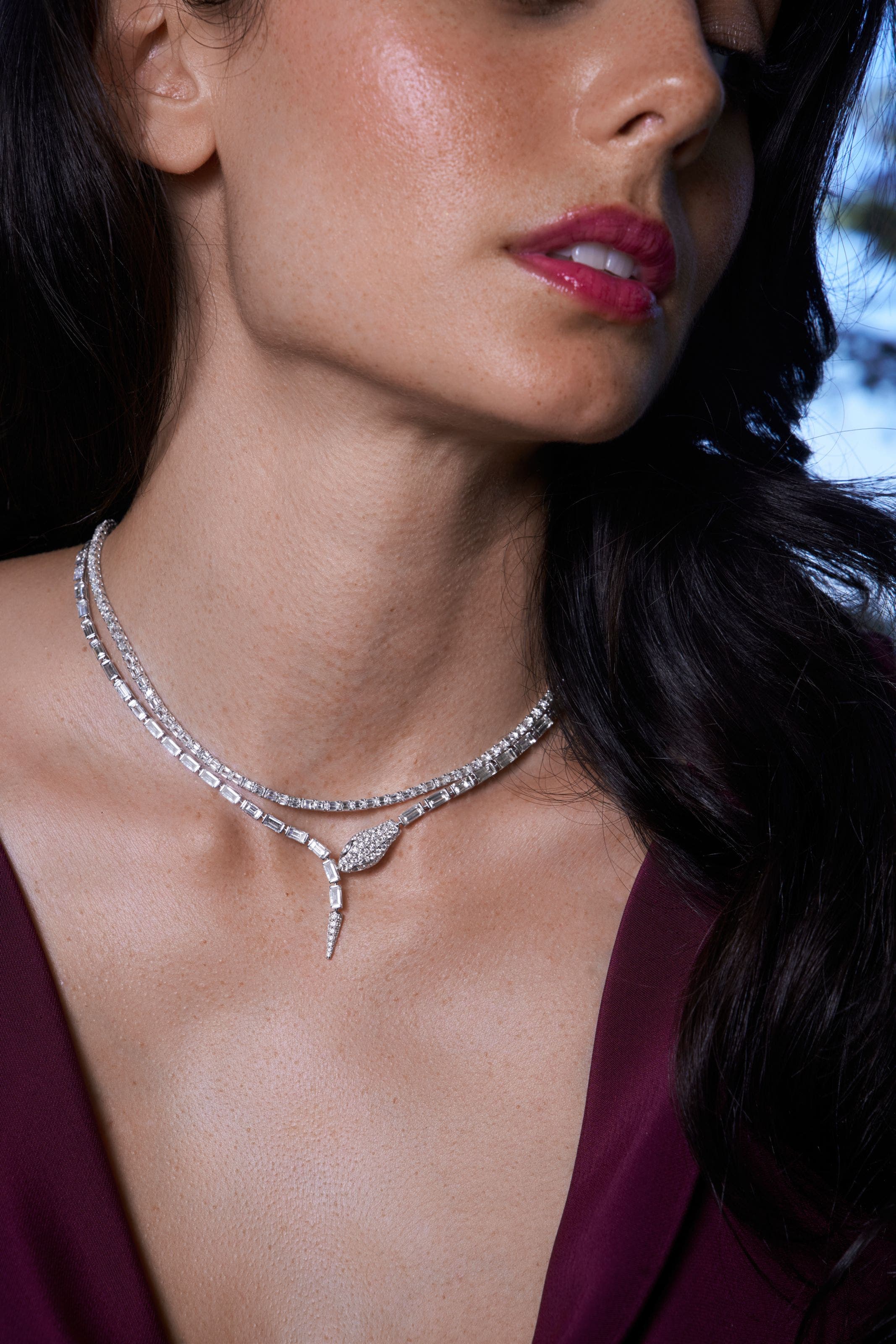 A woman wearing a Bony Levy necklace.