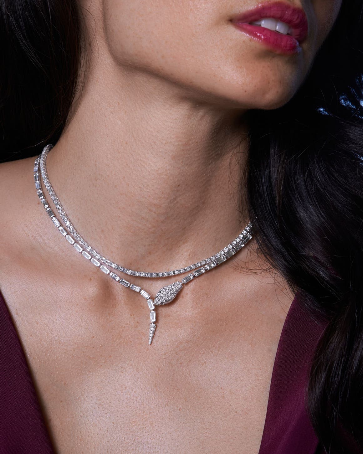 A woman wearing a Bony Levy necklace.