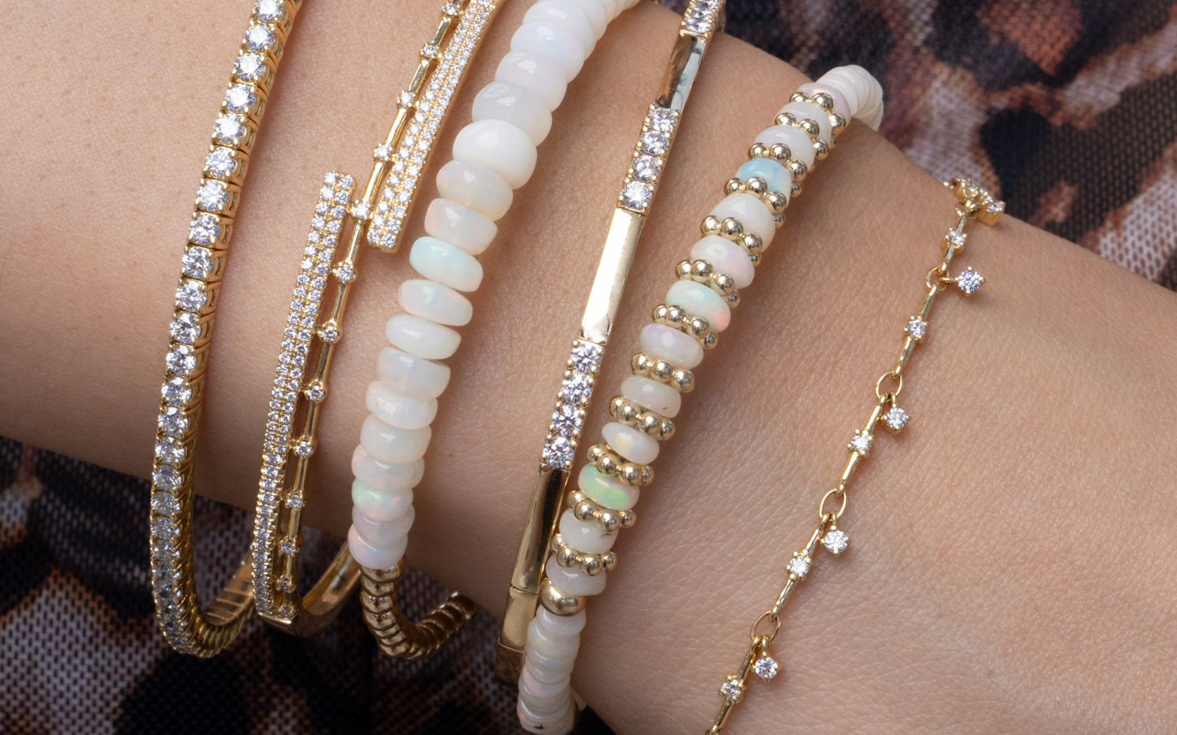 A woman wearing several bracelets.