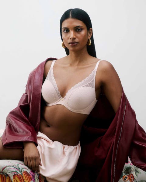Woman wearing Chantelle lingerie t-shirt bra.