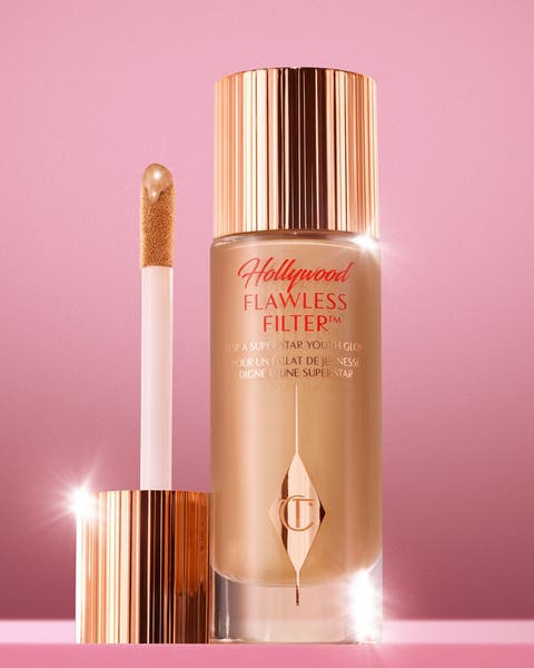 Charlotte Tilbury's Hollywood Flawless Filter foundation bottle and applicator.