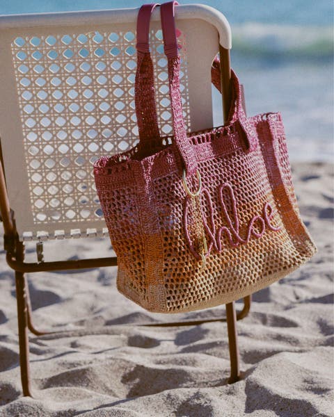 Pink and orange ombre Chloé raffia woven beach bag.