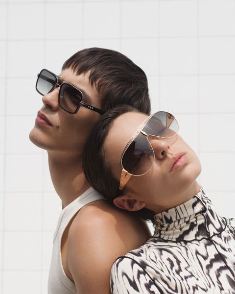 Woman wearing Christian Louboutin sunglasses.