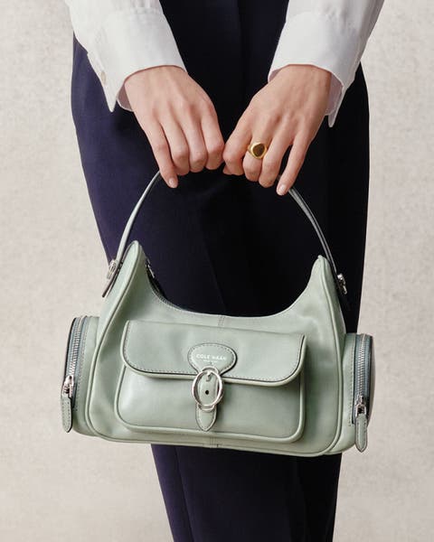 Cole Haan turquoise handbag.