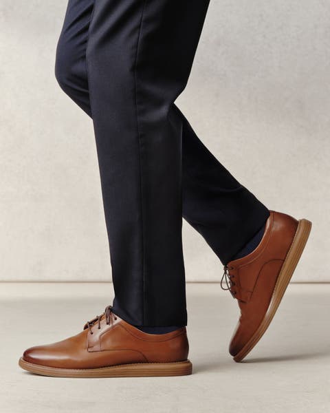 Brown Men's Cole Haan oxfords.