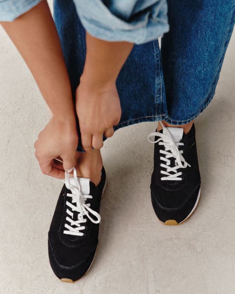 Black women's Cole Haan sneakers.