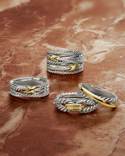 Several silver and gold rings.