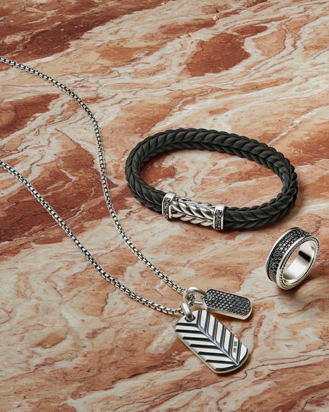 An assortment of men's jewelry.