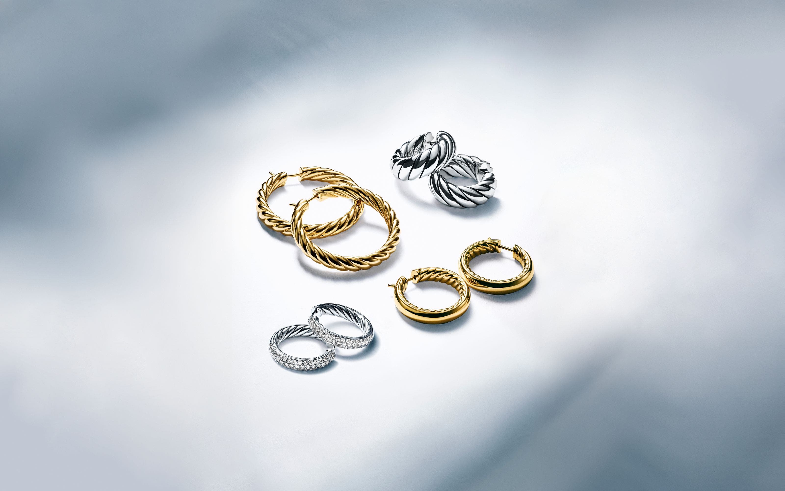 Silver and gold hoops in various sizes.
