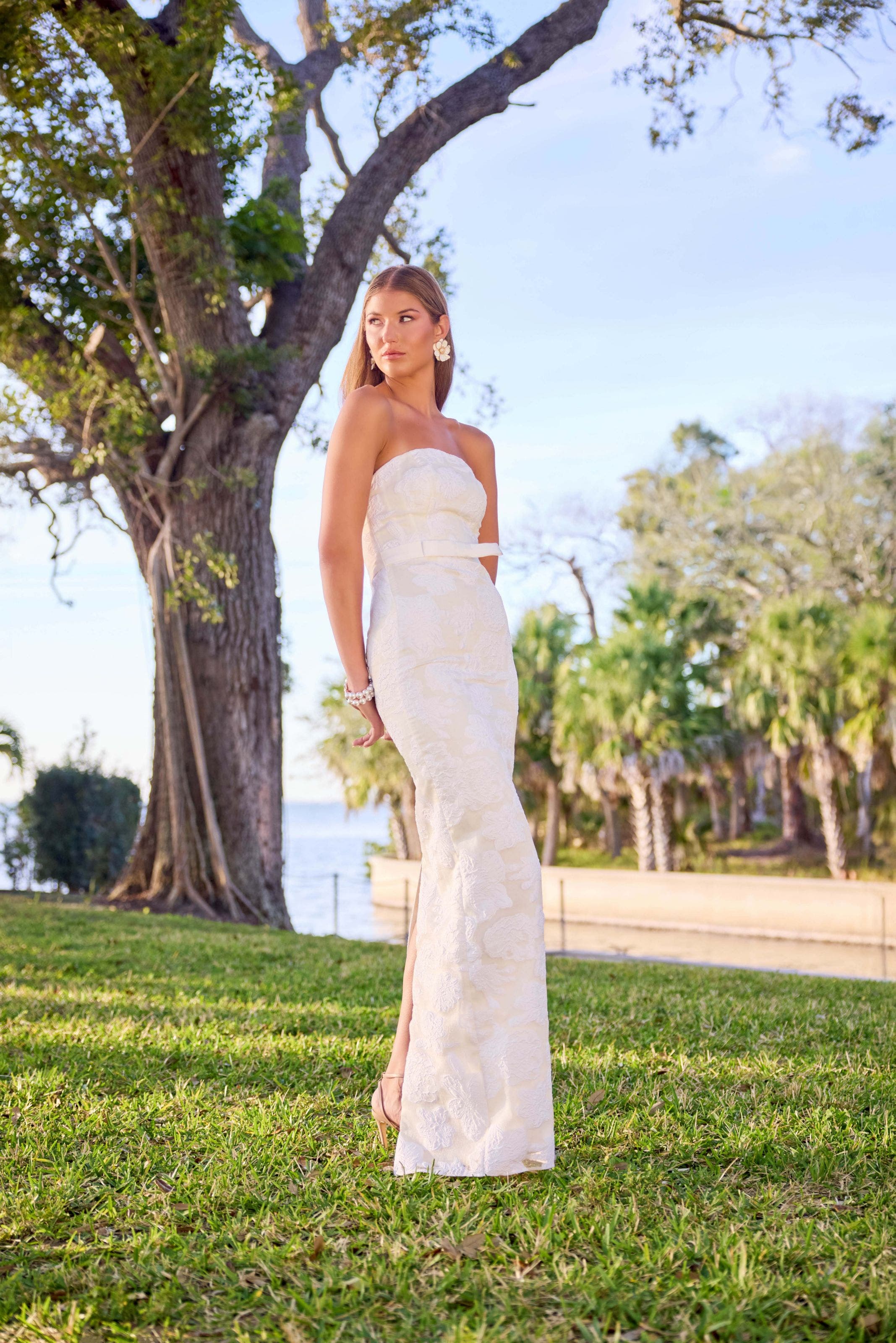 women in white strapless gown.