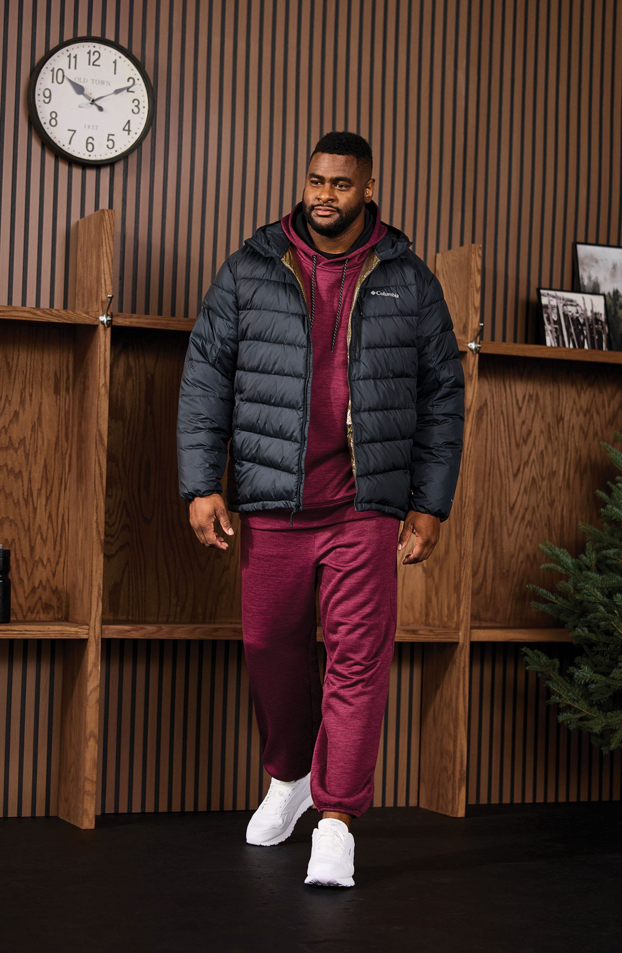 A man wearing a puffer jacket.