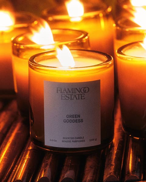 Lit Flamingo Estate candles.