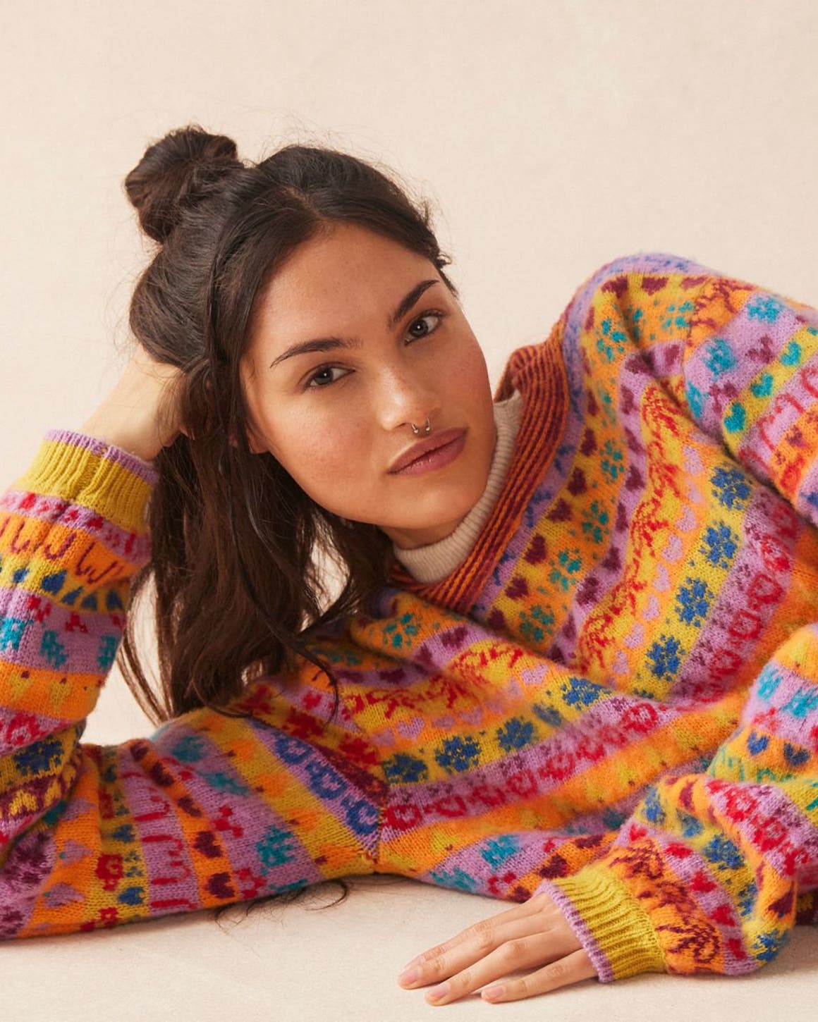 Woman wearing Free People sweater