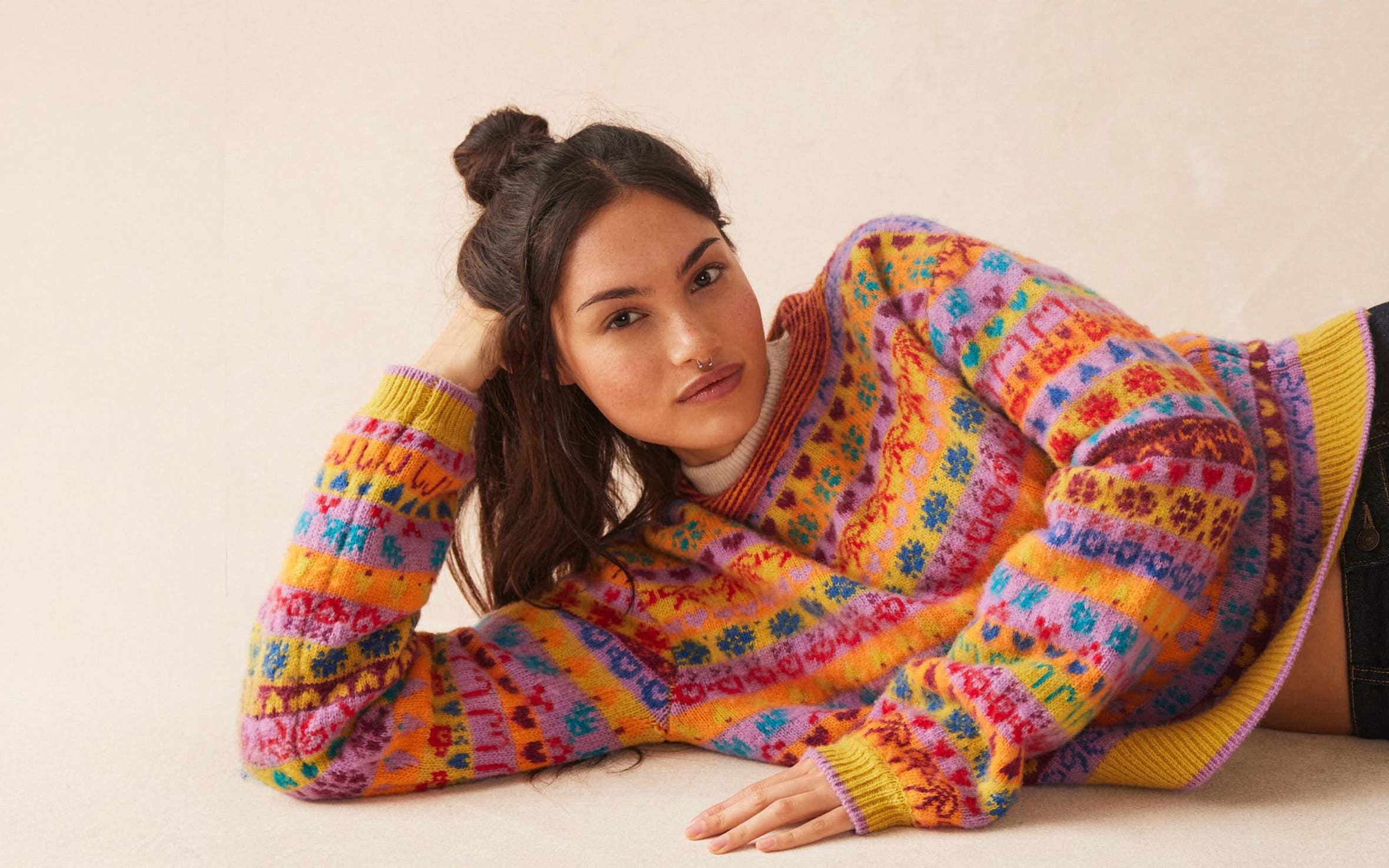 Woman wearing Free People sweater