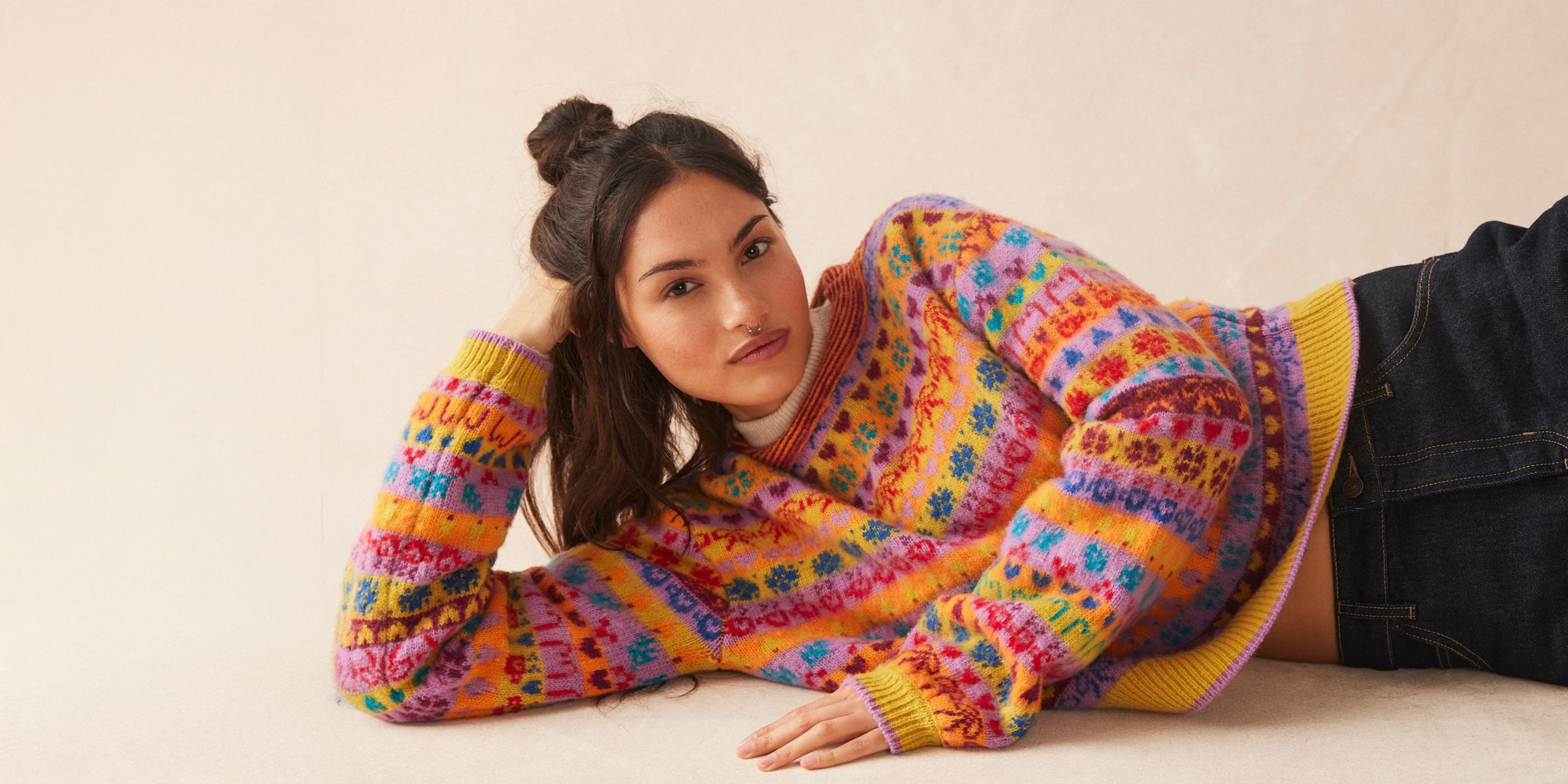 Woman wearing Free People sweater