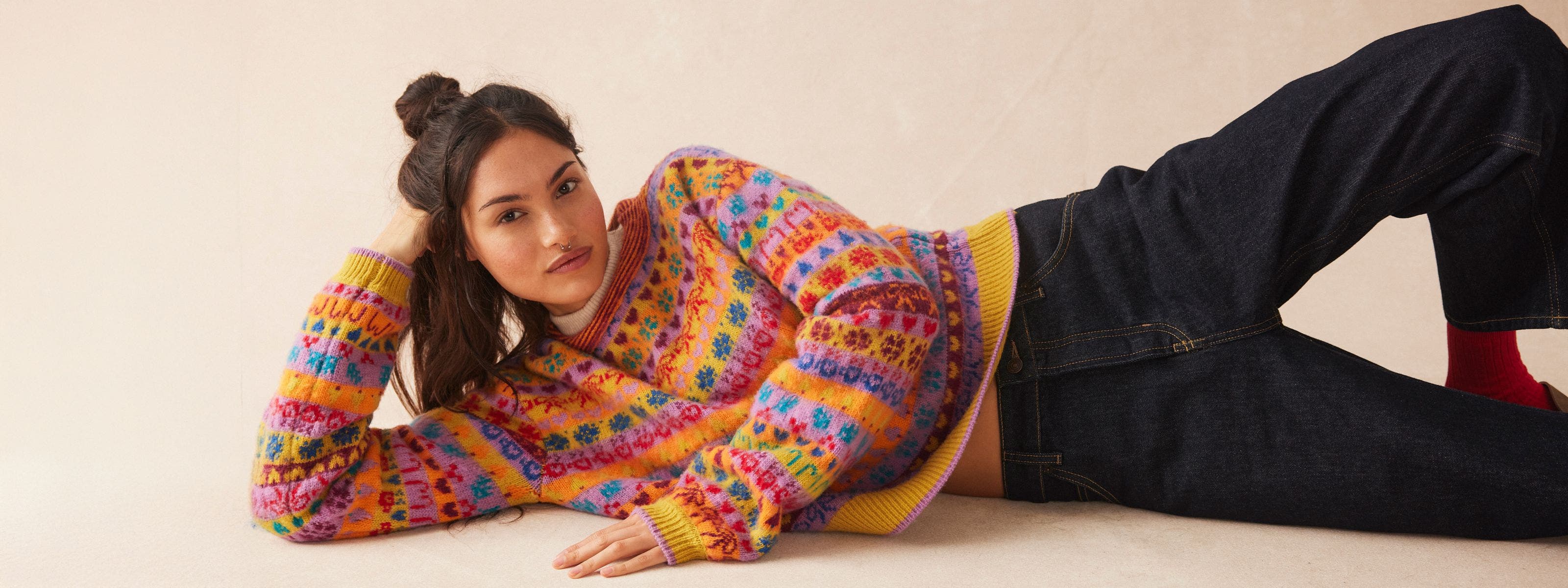 Woman wearing Free People sweater